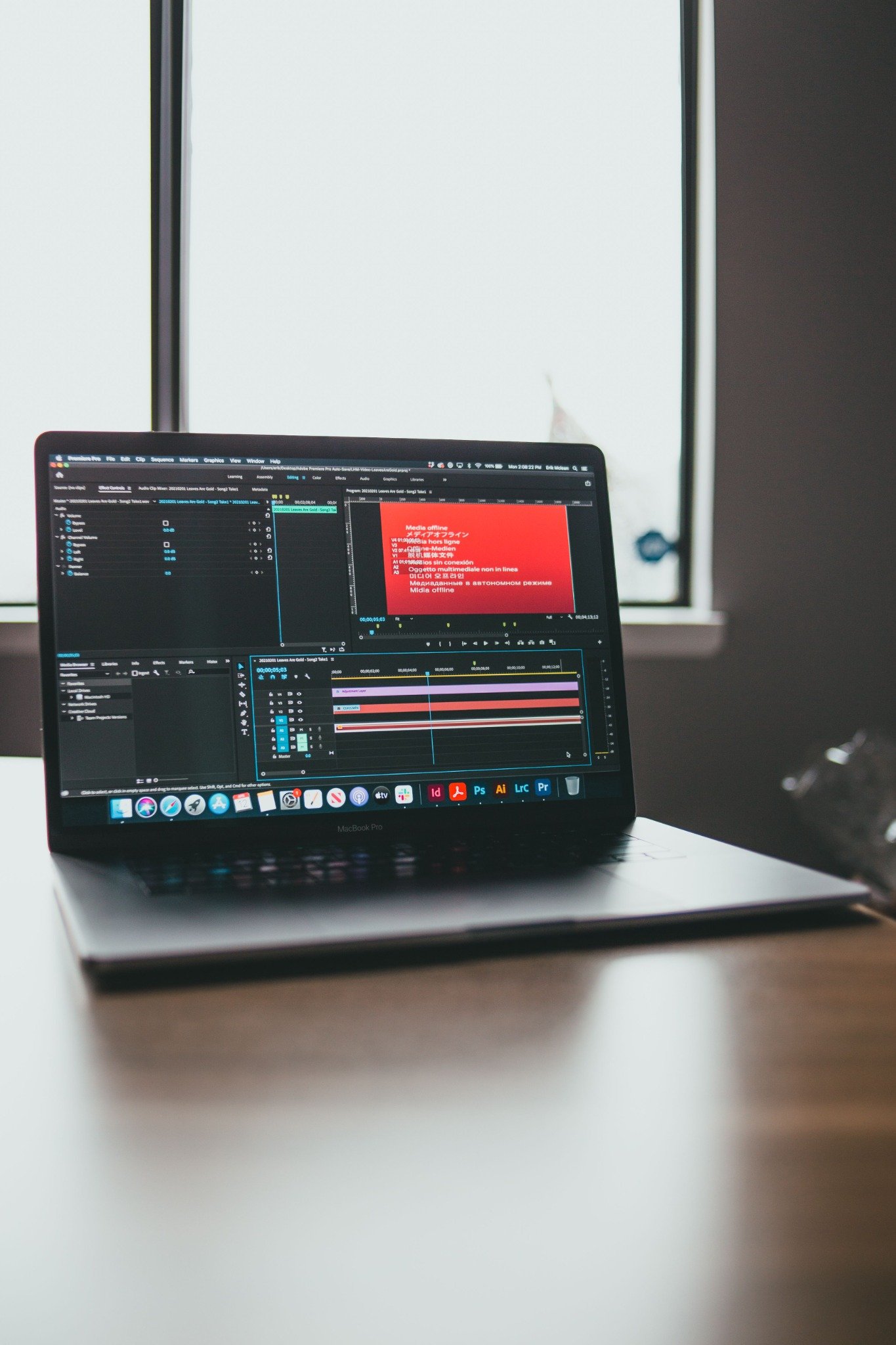 Laptop displaying workflow software for an AI automation cost guide