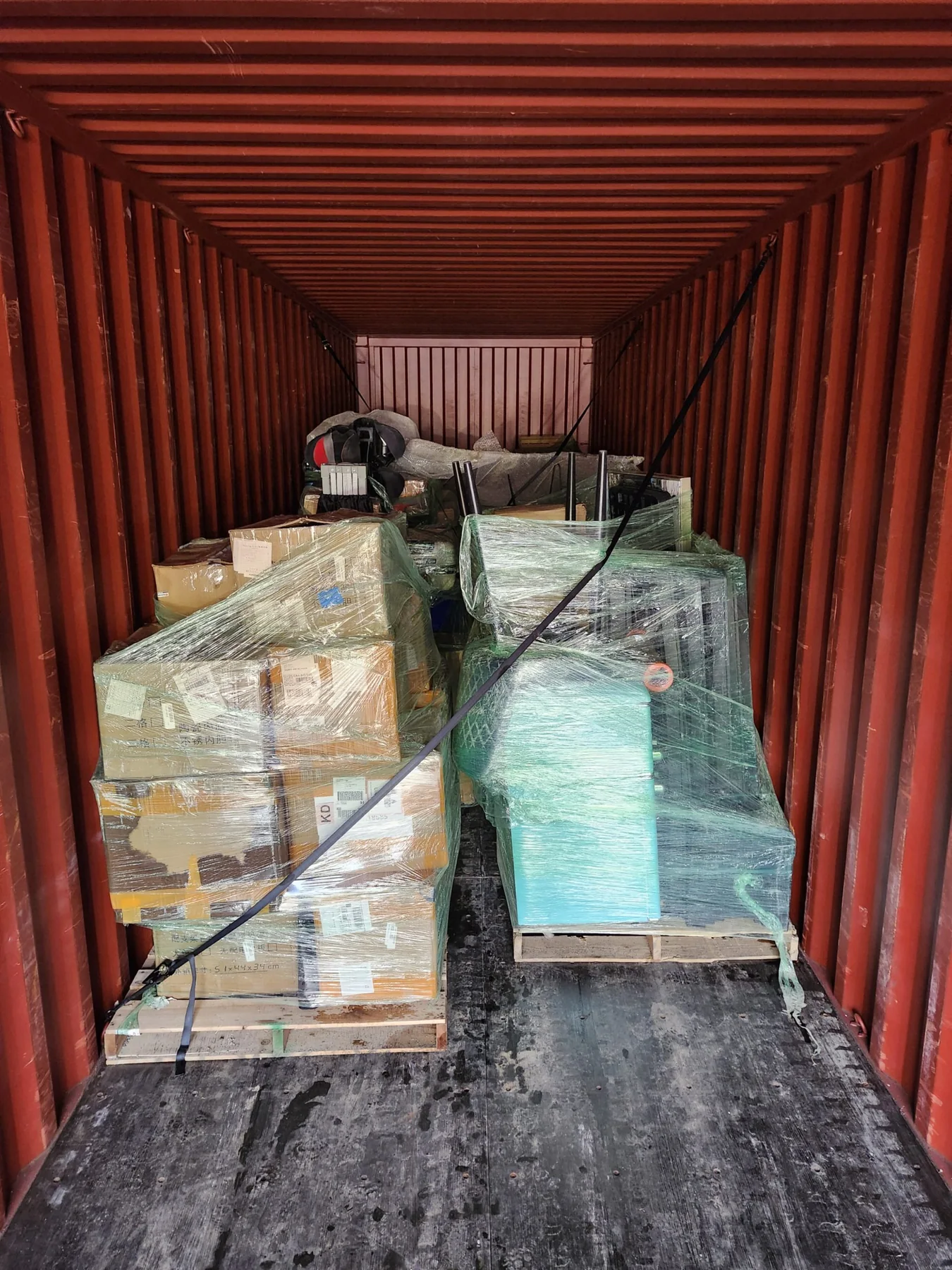 International freight loaded and secured inside a shipping container