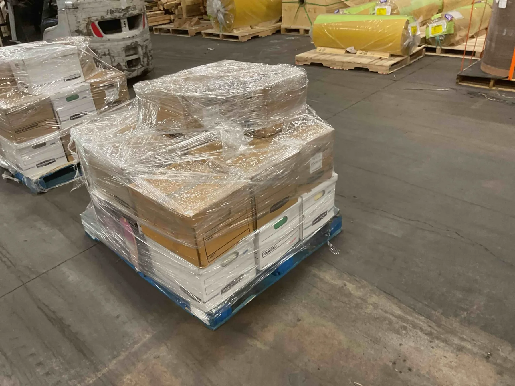 Palletized commercial freight prepared for shipment in a BriCargo facility